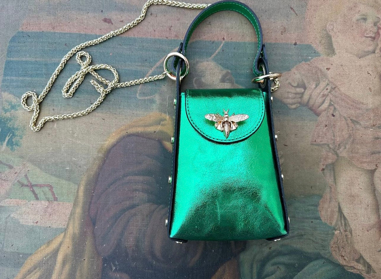 Green leather cell phone pouch.