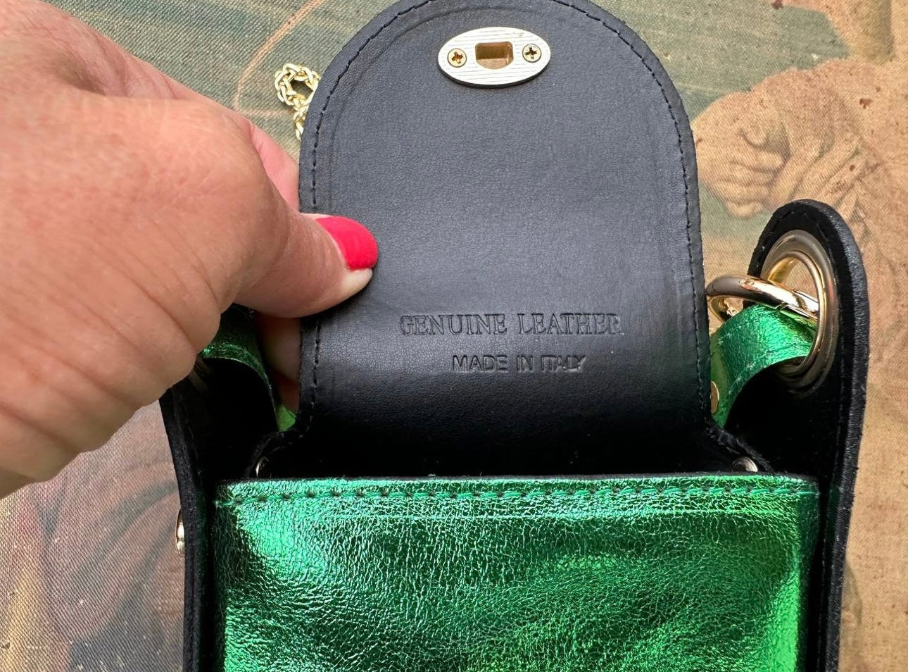 Green leather cell phone pouch.