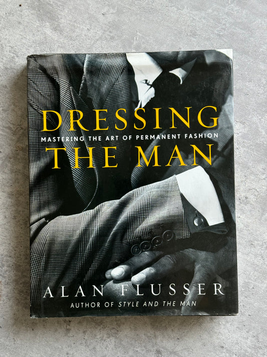 “Dressing the Man. Mastering the Art of Permanent Fashion” book by Alan Flusser.