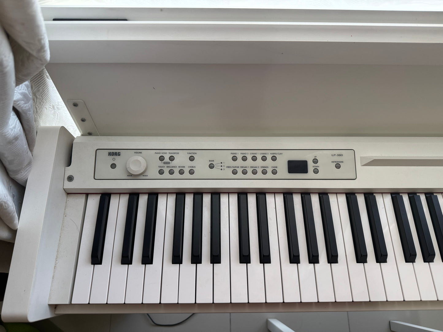 Korg Upright Electric Piano with the stool