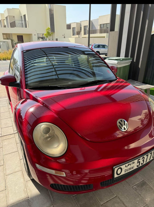 Volkswagen Beetle, 2010 model, red