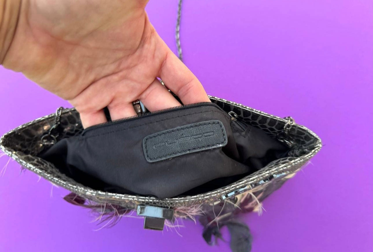 Vintage Custo Barcelona feather bag 2000s,  y2k fashion. Metallic silver evening clutch bag with long chain strap.