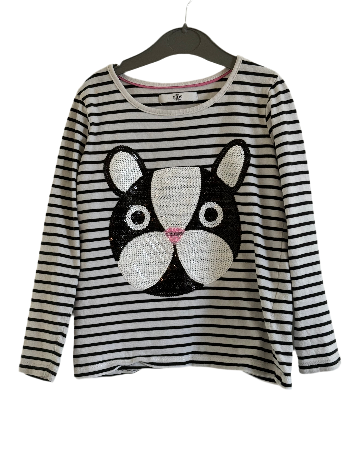 A long sleeved kids' te-shirt with a striped background featuring a cartoon bear's face and body in black and white color.